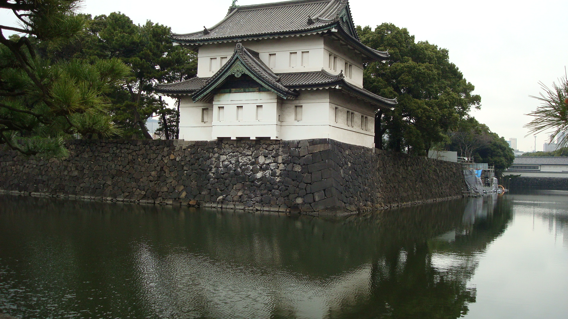 One of the towers. In the distance they appear to be working on the wall.
